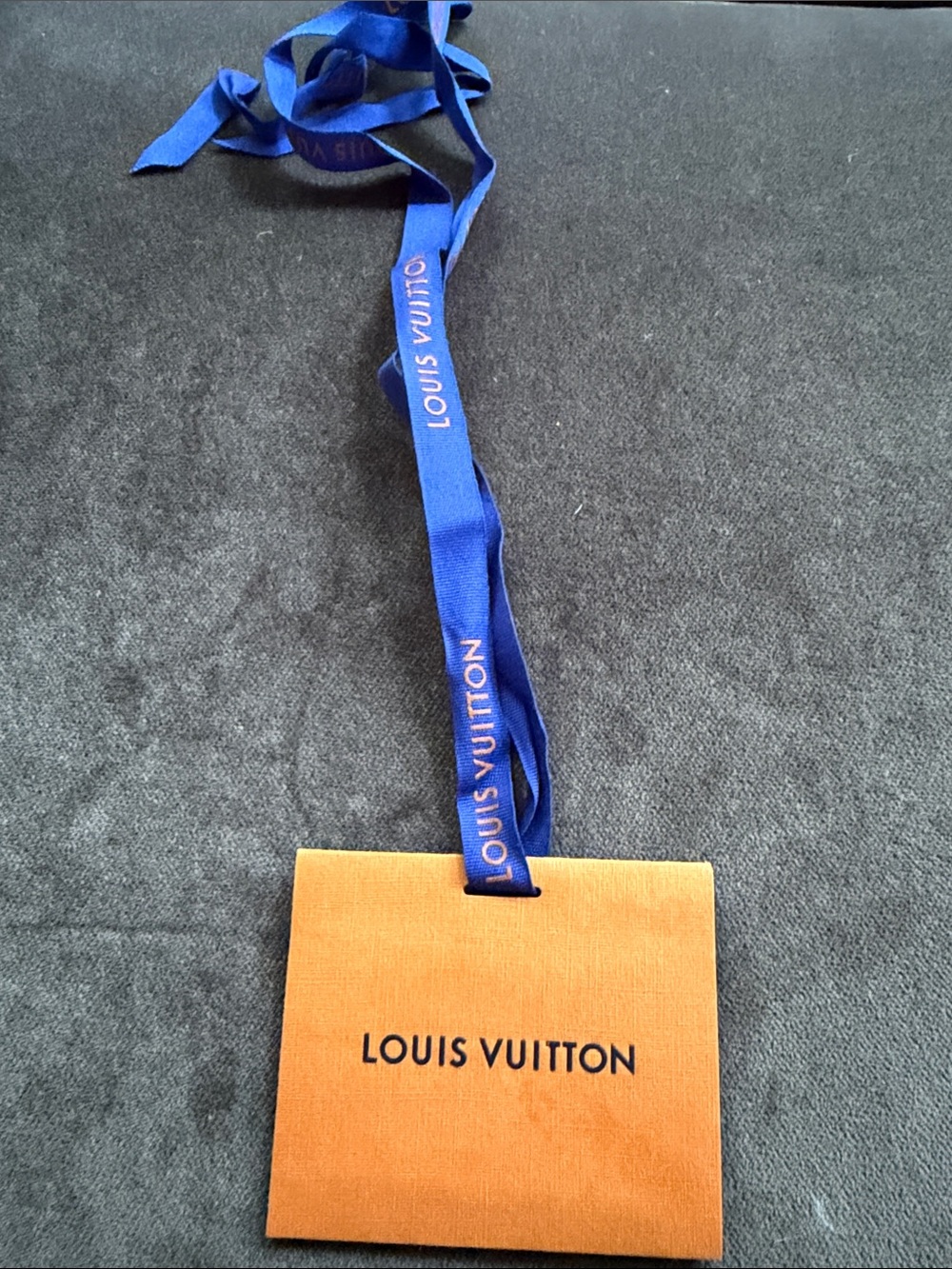 Louis Vuitton Orange Pouch with Blue Branded Ribbon